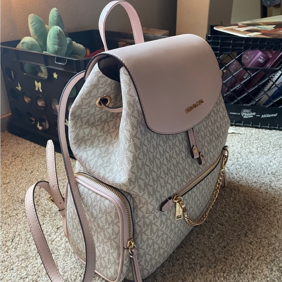 Selling my michael kors backpack! only used 3 times, really cute pink color. - Picture 1 of 4